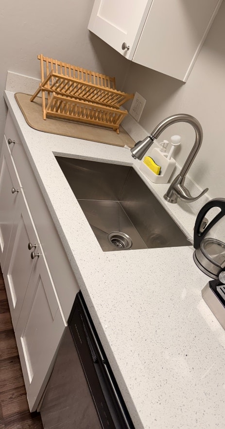 After: kitchen sink & counters cleaned by L&P Clean Breeze